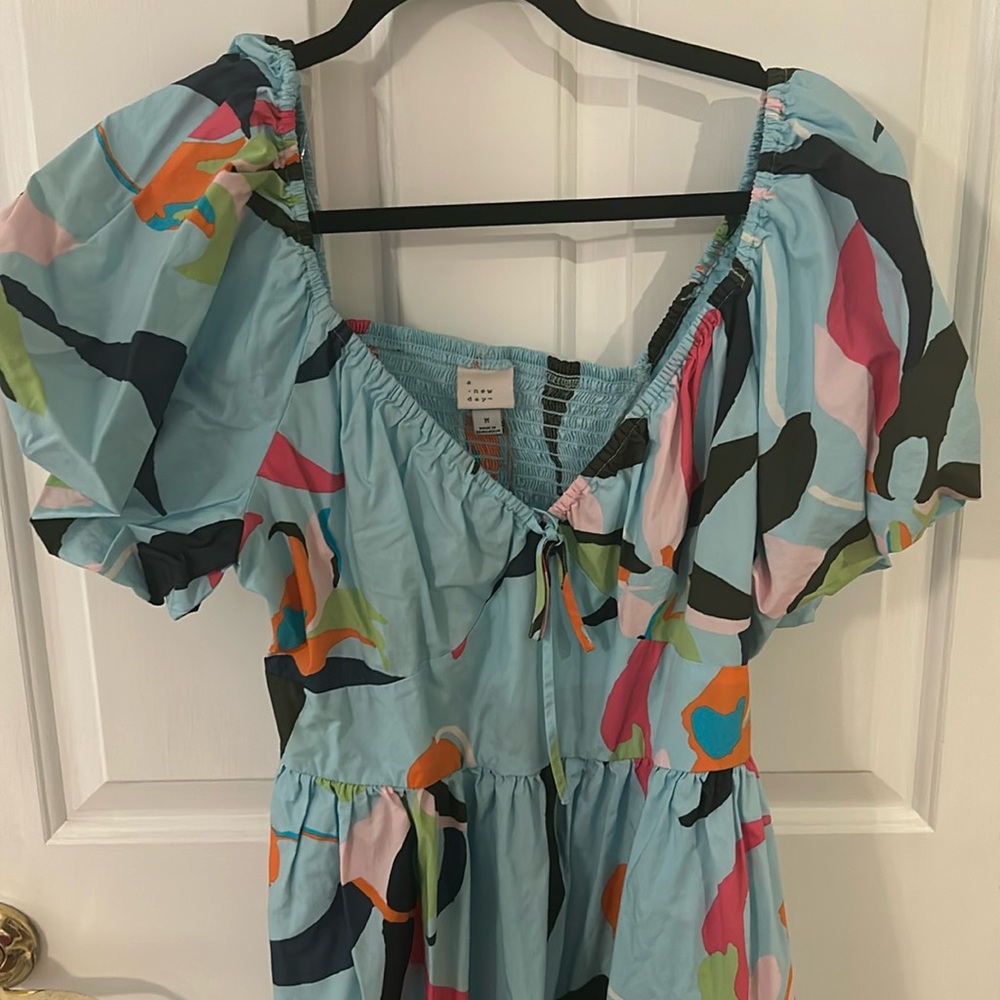 Size medium. Colorful dress. Never worn